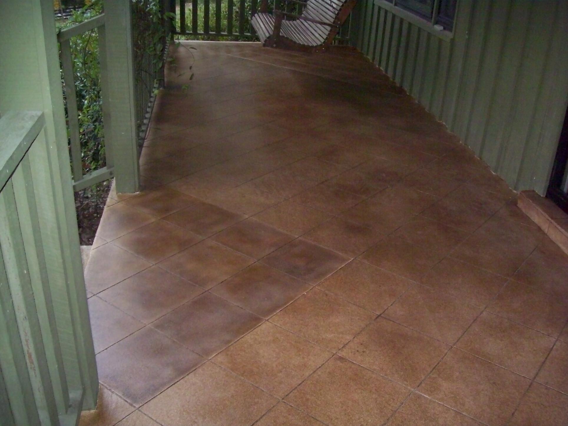 Acid stained cementitious overlay