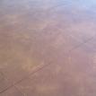 (87) Stained and sealed concrete